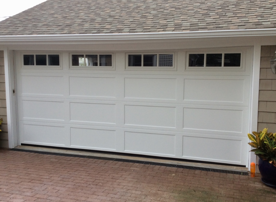 Professional technician repairing a garage door in Orlando, FL - Expert garage door repair services